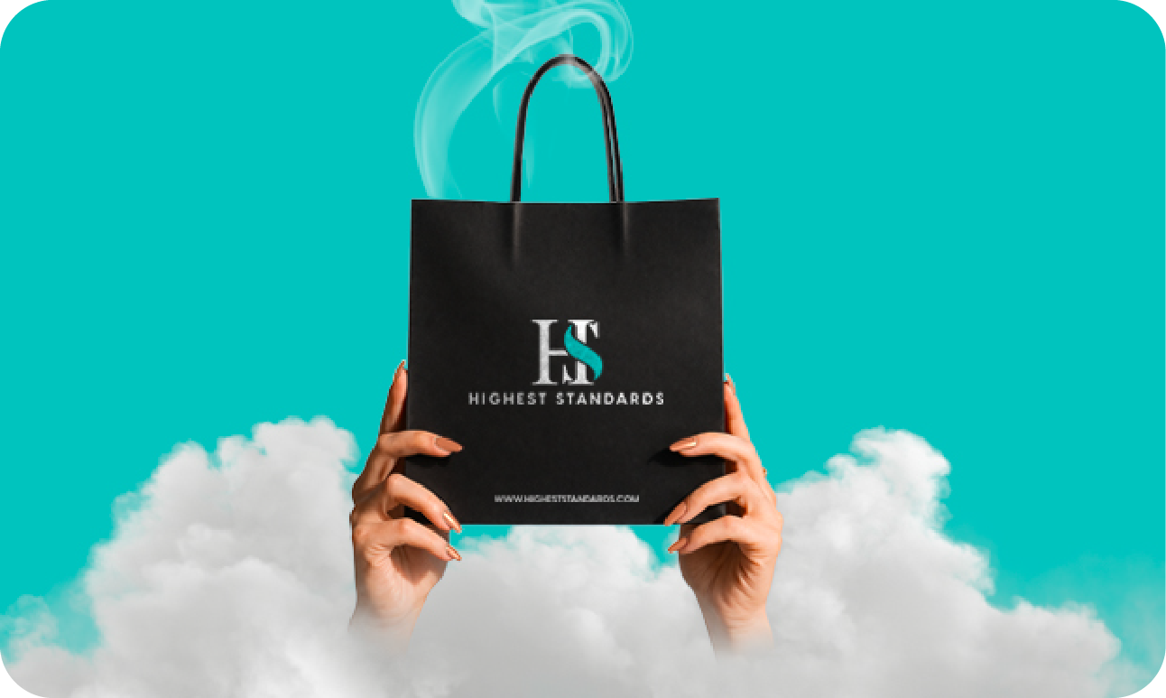 Highest Standards bag held up in the clouds
